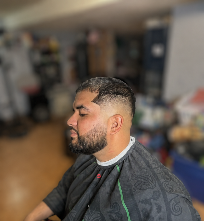 Sharp burst fade with defined beard line by Almighty Cutz By Jesus.