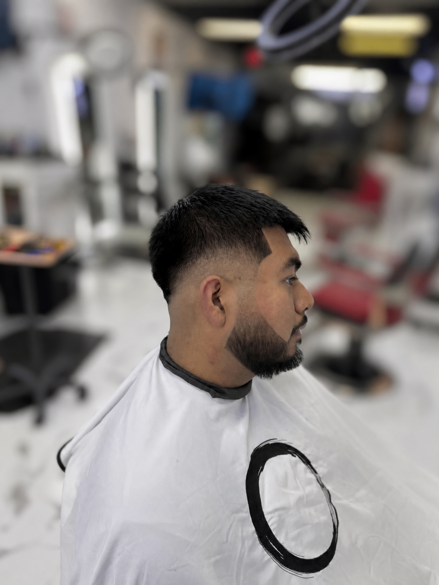 Sharp mid fade haircut and beard blend by Almighty Cutz By Jesus.