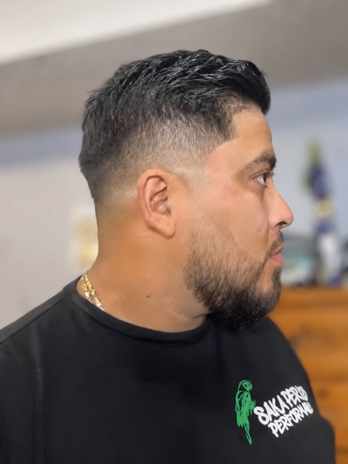 Side profile fade haircut with textured top by Almighty Cutz By Jesus.